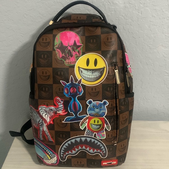 brown spray ground backpack